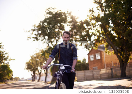 Bicycle, transport and man in road walking with lens flare for exercise, commute and cycling in morning. Travel, city and male cyclist with bike for eco friendly traveling, carbon neutral and journey Bicycle, transport and man in road walking with lens flare for exercise, commute and cycling in morning. Travel, city and male cyclist with bike for eco friendly traveling, carbon neutral and journey 133035908
