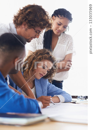Business people, writing and planning on project for collaboration, strategy or ideas at office. Group of employees with documents or paperwork in meeting or teamwork for brainstorming at workplace Business people, writing and planning on project for collaboration, strategy or ideas at office. Group of employees with documents or paperwork in meeting or teamwork for brainstorming at workplace 133035969