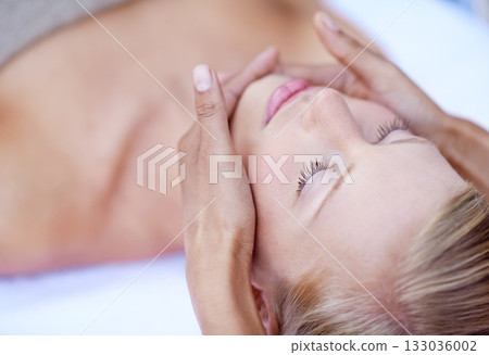 Relax, massage and facial, woman at spa for health and wellness in luxury treatment with eyes closed. Beauty salon, professional skin care therapist and healthy face of girl with cosmetic therapy. Relax, massage and facial, woman at spa for health and wellness in luxury treatment with eyes closed. Beauty salon, professional skin care therapist and healthy face of girl with cosmetic therapy. 133036002