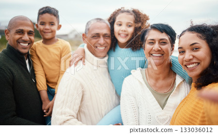 Family, portrait and selfie at a beach by children, parents and grandparents bonding in nature. Face, love and kids with mother, father and seniors at the sea for travel, photo and vacation in Miami Family, portrait and selfie at a beach by children, parents and grandparents bonding in nature. Face, love and kids with mother, father and seniors at the sea for travel, photo and vacation in Miami 133036012