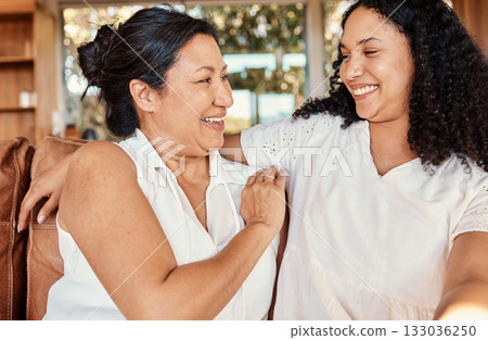 Woman, senior mother and smile of family on a living room sofa with happiness and bonding. Mama love, support and happy elderly care with women on a lounge couch in a house together with a hug 133036250