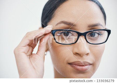 Customer, portrait or glasses in eyes, healthcare wellness or optometry help at retail store, shop or medical clinic. Zoom, face or woman hands and eyewear, prescription lens or designer vision frame Customer, portrait or glasses in eyes, healthcare wellness or optometry help at retail store, shop or medical clinic. Zoom, face or woman hands and eyewear, prescription lens or designer vision frame 133036279