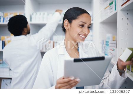 Pharmacist, woman or digital tablet for medicine check, stock take or medical research in drugs store. Smile, happy or pharmacy worker on technology for pills, checklist or ecommerce healthcare order 133036297