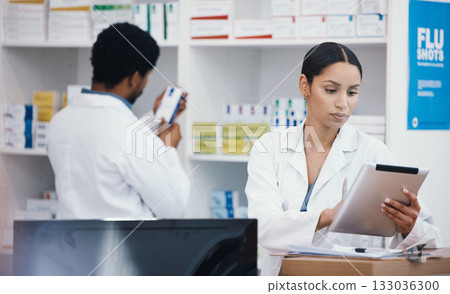 Pharmacist, worker or digital tablet for medicine check, stock take or medical research in drugs store. Smile, happy or pharmacy woman on technology for pills, checklist or ecommerce healthcare order Pharmacist, worker or digital tablet for medicine check, stock take or medical research in drugs store. Smile, happy or pharmacy woman on technology for pills, checklist or ecommerce healthcare order 133036300