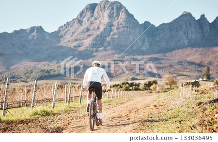 Back of man, mountains and cycling in nature, countryside and training for triathlon, sports and race in Cape Town. Cyclist, mountain bike and outdoor bicycle for marathon fitness, exercise or cardio 133036495
