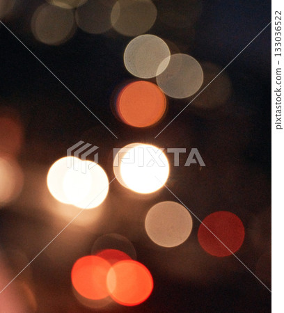 Night, bokeh and pattern of creative light in city for glow, glitter and texture on blurred background with nobody. Abstract, art and festival with shine backdrop for sparkle, disco or pop decoration Night, bokeh and pattern of creative light in city for glow, glitter and texture on blurred background with nobody. Abstract, art and festival with shine backdrop for sparkle, disco or pop decoration 133036522