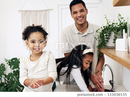 Family, father and children washing hands in portrait, hygiene and health with happiness at home. Man, young girls together and smile in bathroom, healthy and clean for safety from bacteria Family, father and children washing hands in portrait, hygiene and health with happiness at home. Man, young girls together and smile in bathroom, healthy and clean for safety from bacteria 133036535
