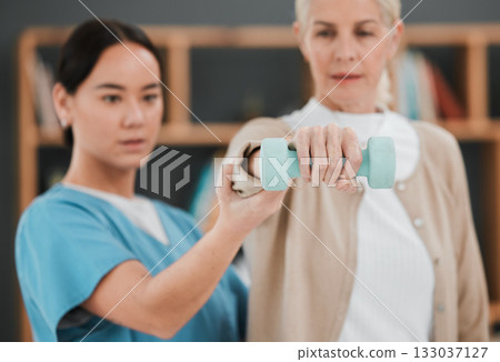Patient hand, dumbbell and physiotherapy rehabilitation nurse help for fitness, muscle and support. Healthcare physiotherapist woman with elderly person for physical therapy and stretching exercise Patient hand, dumbbell and physiotherapy rehabilitation nurse help for fitness, muscle and support. Healthcare physiotherapist woman with elderly person for physical therapy and stretching exercise 133037127
