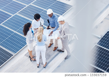 Solar energy, business people or engineering team with blueprint on roof building grid technology for sustainability. Collaboration, top or employees talking or planning development project strategy Solar energy, business people or engineering team with blueprint on roof building grid technology for sustainability. Collaboration, top or employees talking or planning development project strategy 133037159