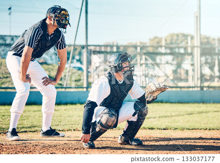Sports, baseball and umpire with man on field for fitness, pitching and championship training. Workout, catcher and exercise with athlete playing at stadium for competition match, cardio and league Sports, baseball and umpire with man on field for fitness, pitching and championship training. Workout, catcher and exercise with athlete playing at stadium for competition match, cardio and league 133037177