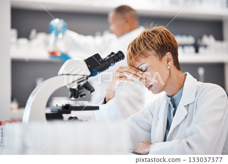 Scientist with headache, burnout and tired with woman, overworked with overtime for science breakthrough. Medical research, scientific innovation and senior female, fatigue and overwhelmed in lab Scientist with headache, burnout and tired with woman, overworked with overtime for science breakthrough. Medical research, scientific innovation and senior female, fatigue and overwhelmed in lab 133037377
