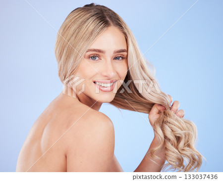 Hair care, beauty and face portrait of woman in studio isolated on a blue background. Cosmetics, keratin and happy young female model with salon treatment for hairstyle, blonde balayage and growth. Hair care, beauty and face portrait of woman in studio isolated on a blue background. Cosmetics, keratin and happy young female model with salon treatment for hairstyle, blonde balayage and growth. 133037436