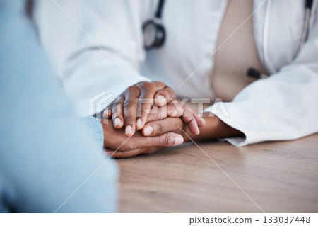Holding hands closeup, doctor and patient consultation for healthcare support, services and sad news, test results or help. Clinic, medical professional or black people consulting, helping and advice Holding hands closeup, doctor and patient consultation for healthcare support, services and sad news, test results or help. Clinic, medical professional or black people consulting, helping and advice 133037448