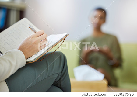 Therapy, therapist notebook and woman listening, help and support of mental health problem and writing notes. Psychology, counseling and psychologist review, analysis and consulting patient or person Therapy, therapist notebook and woman listening, help and support of mental health problem and writing notes. Psychology, counseling and psychologist review, analysis and consulting patient or person 133037589