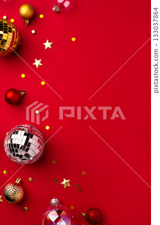 Christmas ornaments on a red background. 133037864