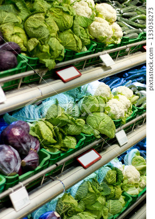 Food, shopping and health with fresh produce in supermarket for sale, nutrition and retail. Grocery, consumer and offer with organic vegetables on shelf of store for diet, purchase and products 133038273