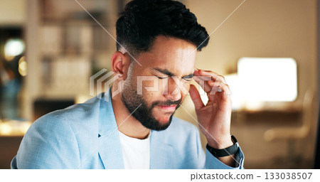 Night, burnout and headache by business man in office worry, stress or tax, audit or mistake. Working late, anxiety and male manager with temple massage for vertigo, brain fog or deadline pressure Night, burnout and headache by business man in office worry, stress or tax, audit or mistake. Working late, anxiety and male manager with temple massage for vertigo, brain fog or deadline pressure 133038507