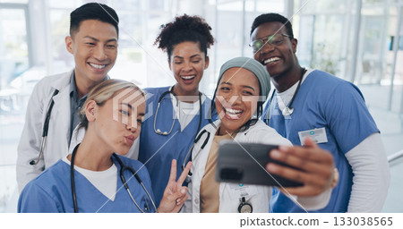 Selfie, men and women in healthcare with diversity, team building and hospital on social media. Photography, doctors and nurses together with smile, staff and medical professional friends at clinic. 133038565