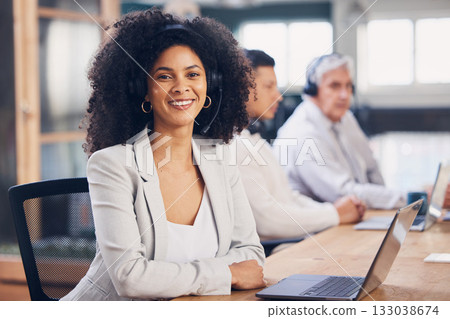 Portrait, laptop and customer service with a black woman consulting in her telesales office for work. Contact us, support and call center with a female employee or consultant using a headset Portrait, laptop and customer service with a black woman consulting in her telesales office for work. Contact us, support and call center with a female employee or consultant using a headset 133038674