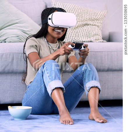 Woman, video games and virtual reality headset on home floor for online gaming, ar and relax. Gamer person with console for vr metaverse, esports and cyber or 3d digital world with futuristic tech 133038695