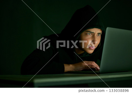 Indian woman, hacker and mockup of banking and database web fraud with crypto data. Programmer, criminal and finance software hack with a hacking expert writing algorithm for cybercrime virus 133038896