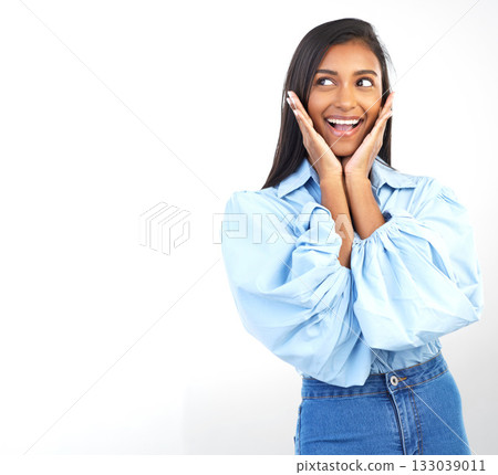 Mockup space, excited and Indian woman on a white background for discount, deal and sale information. Smile, advertising and happy girl with wow smile for product placement, branding and promotion 133039011