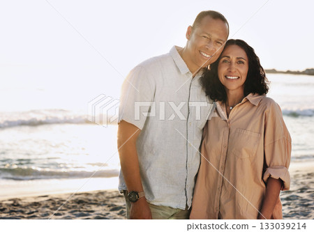 Senior couple, smile and portrait at beach, having fun on vacation or holiday mockup. Romance, love or happy, elderly and retired man and woman by ocean or seashore enjoying time together at sunset 133039214