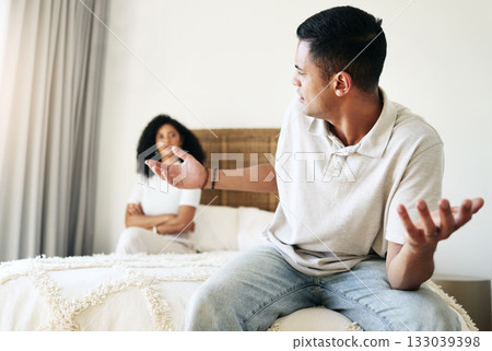 Argument, stress and couple in bedroom for conflict, breakup conversation and communication. Sad, angry and man speaking to a woman about relationship, divorce and frustrated with problem in marriage Argument, stress and couple in bedroom for conflict, breakup conversation and communication. Sad, angry and man speaking to a woman about relationship, divorce and frustrated with problem in marriage 133039398