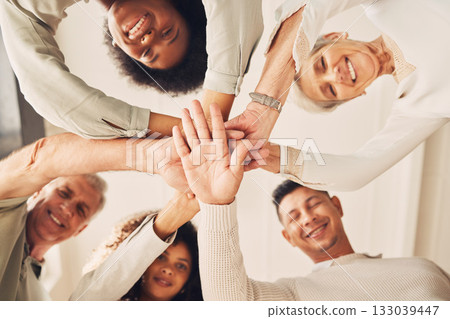 Happy business people, portrait or hands stack for company diversity, solidarity or startup collaboration. Corporate group, mission teamwork or below view of staff team building for community support Happy business people, portrait or hands stack for company diversity, solidarity or startup collaboration. Corporate group, mission teamwork or below view of staff team building for community support 133039447