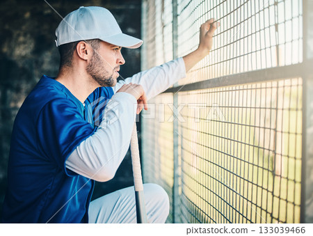 Baseball, dugout and man watching game holding bat, concentration, competition and sport. Fitness, health and serious sports player waiting for turn to play in fun practice match at stadium or field. Baseball, dugout and man watching game holding bat, concentration, competition and sport. Fitness, health and serious sports player waiting for turn to play in fun practice match at stadium or field. 133039466