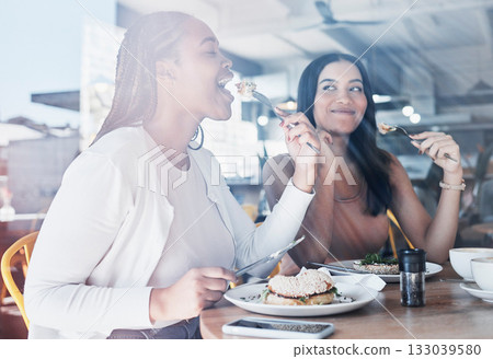 Food, friends and smile, women in cafe eating together on lunch date on fun summer weekend. Friendship, social and hungry people, girl and friend in restaurant or coffee with sunshine and sandwich. 133039580