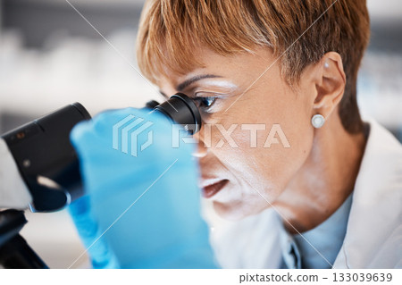 Research, microscope and science with black woman in laboratory for experiment, medical and pharmacy. Healthcare, medicine and results with expert looking for pathology, test and sample analysis 133039639