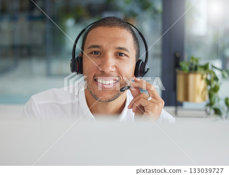 Smile, talking and portrait of a man in a call center for online support, consulting and advice. Happy, conversation and face of a customer service agent working in telemarketing, sales and helpline 133039727