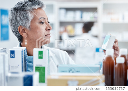 Senior woman, pharmacist and check with box, medicine or pills by shelf in store for healthcare services. Elderly pharma expert, retail stock and medical product for mockup space, health and wellness Senior woman, pharmacist and check with box, medicine or pills by shelf in store for healthcare services. Elderly pharma expert, retail stock and medical product for mockup space, health and wellness 133039737