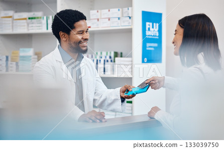 Pharmacy, payment and pharmacist with customer with card for medicine, drugs and medical prescription. Healthcare, wellness and black man help, service and smile at client with machine for medication Pharmacy, payment and pharmacist with customer with card for medicine, drugs and medical prescription. Healthcare, wellness and black man help, service and smile at client with machine for medication 133039750