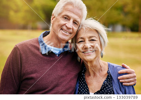 Hug, senior and portrait of a couple in a park to relax, be happy and bonding in Norway. Love, smile and elderly man and woman hugging, giving affection and together in nature during retirement Hug, senior and portrait of a couple in a park to relax, be happy and bonding in Norway. Love, smile and elderly man and woman hugging, giving affection and together in nature during retirement 133039789