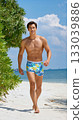 man in bikini on beach 133039886