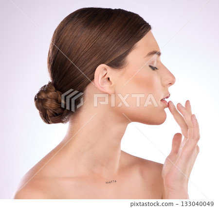Beauty, skincare and lips with a model woman in studio on a gray background for natural skin cosmetics. Luxury, wellness and transformation with an attractive young female touching her mouth Beauty, skincare and lips with a model woman in studio on a gray background for natural skin cosmetics. Luxury, wellness and transformation with an attractive young female touching her mouth 133040049
