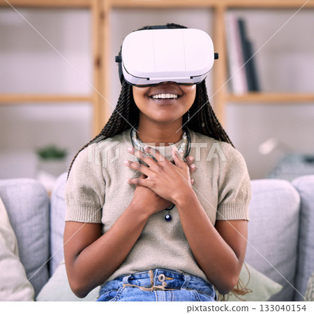 Futuristic, virtual reality glasses and black woman with happiness, hands to chest and living room. Metaverse, Nigerian female and girl with vr, metaverse and gaming with success, achievement or tech Futuristic, virtual reality glasses and black woman with happiness, hands to chest and living room. Metaverse, Nigerian female and girl with vr, metaverse and gaming with success, achievement or tech 133040154