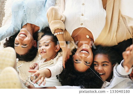 Bed, top view and grandmother, mom and children smile for bonding, quality time and love in bedroom. Big family, happy and portrait of grandma, mother and girls in bedroom relaxing together at home 133040180