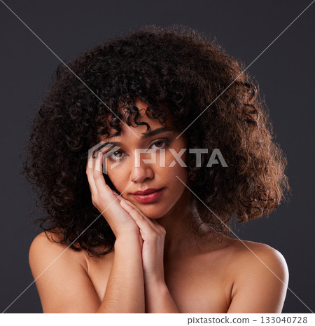 Portrait, natural and beauty by black woman in studio for hair, treatment and body care on black background. Face, girl and curly afro model relax with luxury, soft and glowing skin while isolated Portrait, natural and beauty by black woman in studio for hair, treatment and body care on black background. Face, girl and curly afro model relax with luxury, soft and glowing skin while isolated 133040728