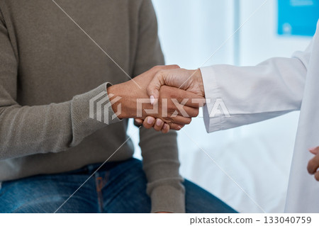 Closeup, handshake and doctor with man, healthcare and appointment for diagnosis, cure and results. Zoom, hand and medical professional with male patient, schedule for procedure and appreciation Closeup, handshake and doctor with man, healthcare and appointment for diagnosis, cure and results. Zoom, hand and medical professional with male patient, schedule for procedure and appreciation 133040759
