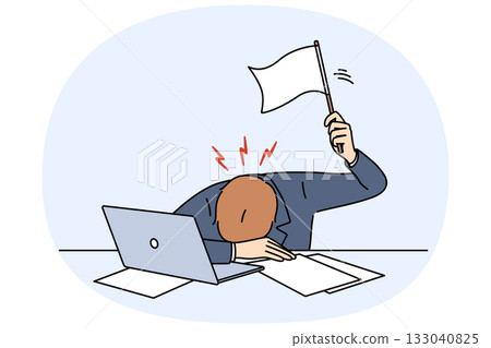 Stressed business man waving white flag after professional burnout, lying at workplace with laptop 133040825