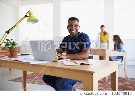 Journalist, portrait or happy black man with laptop for research on online business or copywriting. Smile, digital agency or worker typing for blog content, reports or internet article on computer 133040913