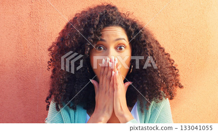 Wow, gossip and portrait of woman with surprise, news or drama announcement on orange background. Omg, emoji and hands on face of female model shocked by secret, story or hearing mind blowing rumor Wow, gossip and portrait of woman with surprise, news or drama announcement on orange background. Omg, emoji and hands on face of female model shocked by secret, story or hearing mind blowing rumor 133041055