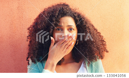 Wow, surprise and portrait of woman with news, gossip or drama announcement on orange background. Omg, emoji and hands on face of female model shocked by secret, drama or hearing mind blowing rumor Wow, surprise and portrait of woman with news, gossip or drama announcement on orange background. Omg, emoji and hands on face of female model shocked by secret, drama or hearing mind blowing rumor 133041056