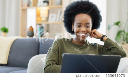 Woman, laptop and sofa for remote work, social media and watch subscription to internet show at home. Happy african freelancer, computer and reading blog for online shopping, elearning and streaming Woman, laptop and sofa for remote work, social media and watch subscription to internet show at home. Happy african freelancer, computer and reading blog for online shopping, elearning and streaming 133041073