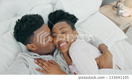Happy couple, kiss and selfie with smile in bed on social media, blog or influencer relax in home with vlog or video call with love. Black woman, man and profile picture of hug in morning or bedroom Happy couple, kiss and selfie with smile in bed on social media, blog or influencer relax in home with vlog or video call with love. Black woman, man and profile picture of hug in morning or bedroom 133041105
