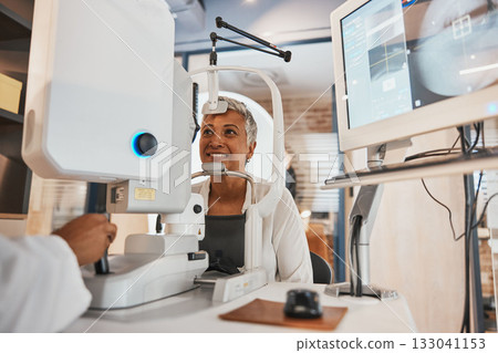 Machine, senior woman and test eyes in office, optometry and healthcare for vision, smile and conversation. Optometrist, mature female customer and client with eye care, research and appointment 133041153