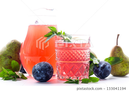 Natural fruit juice from pears and plums with mint leaves 133041194